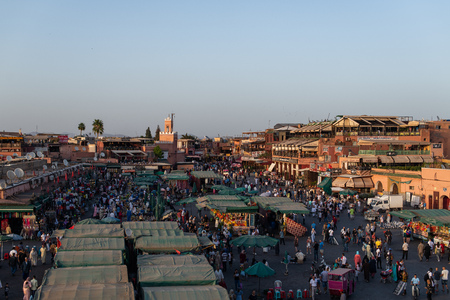 The famous Jamaa el Fna square in Marrakech, Morocco. Jemaa el-Fnaa, Djema el-Fna or Djemaa el-Fnaa is a famous square and market place in Marrakesh's medina quarter. Colorful sunset.のeditorial素材