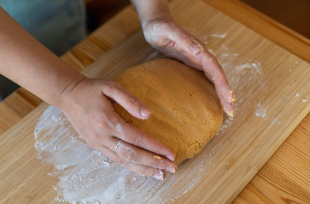 chef at work. making of paleo pumpkin gnocchi. woman hands preparing the food.