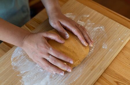 chef at work. making of paleo pumpkin gnocchi. woman hands preparing the food.の写真素材