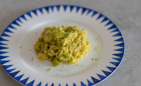 vegetarian risotto with leek and lemonの写真素材