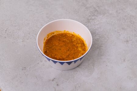 tomato soup in a bowl, top viewの写真素材