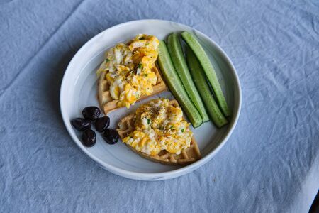Homemade Paleo, Gluten Free and Sugar Free Healthy Waffles served with Scrambled Eggsの写真素材