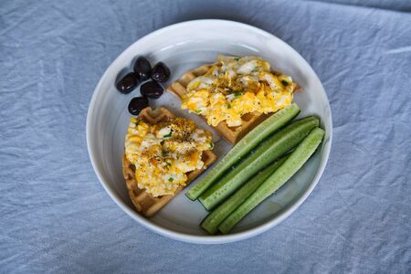 Homemade Paleo, Gluten Free and Sugar Free Healthy Waffles served with Scrambled Eggsの写真素材
