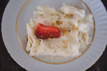 Traditional Turkish Ramadan Dessert Gullac . It is made with gullac (rice wafer or rice paper...