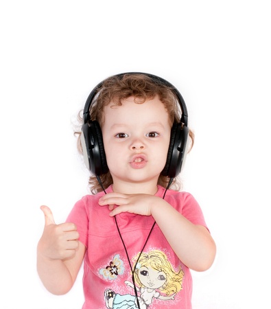 Qute girl in headphoneの写真素材
