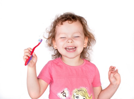 Happy smile girl with toothbrushの写真素材
