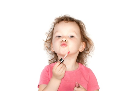 Little girl with lipstickの写真素材