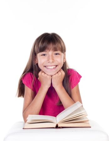 Cute little girl with books  School portrait  Isolated on white backgroundの写真素材
