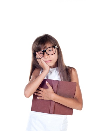 little girl with books wearing glasses, back to school concept, isolated over whiteの写真素材