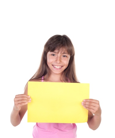Smiling little girl holding empty yellow  board, isolated on whiteの写真素材