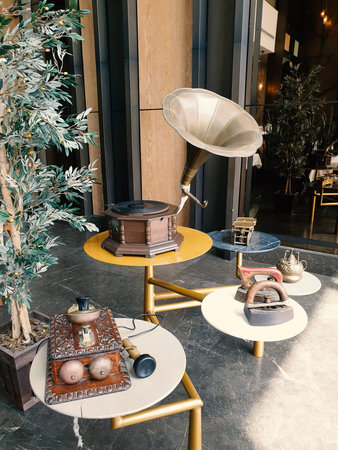 Retro gramophone on the table in the interior of a cafeの写真素材