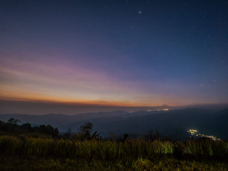 Morning sunrise at PhuLomlo first view point, can see stars and some light from city beautiful with...