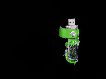 Old USB flash drive in rag cover isolated, black background with clipping Path, Show Implication old information, Havy duty, importance of information.の写真素材