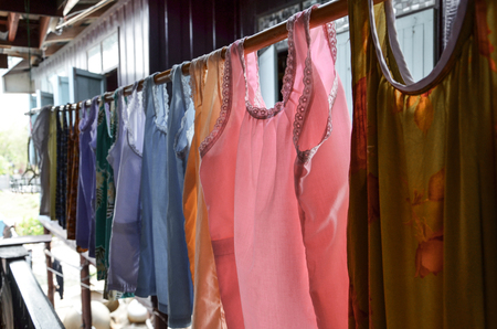 Colorful Thai Traditional Clothes Hangingの写真素材