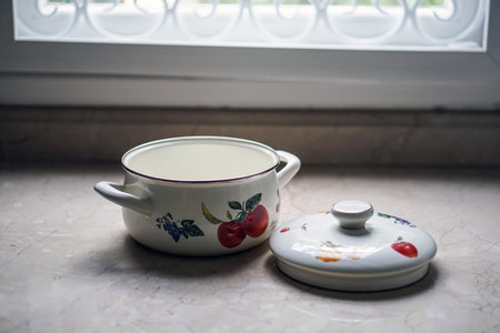 Vintage cooking pot on the kitchen table