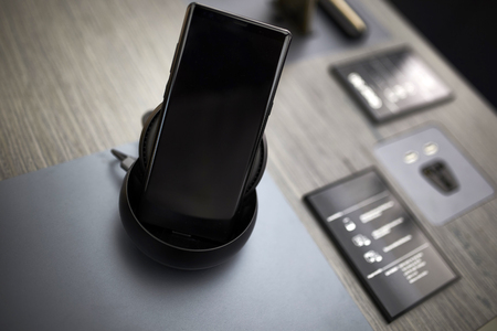 Smartphone on the dock at storeの写真素材