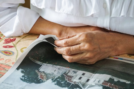 old woman read newspaper