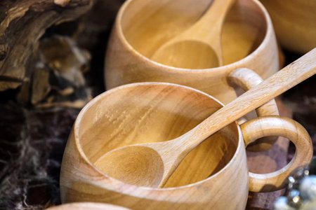 close up wooden cup and spoon