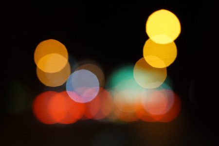 colorful street circle bokeh light dark backgroundの写真素材