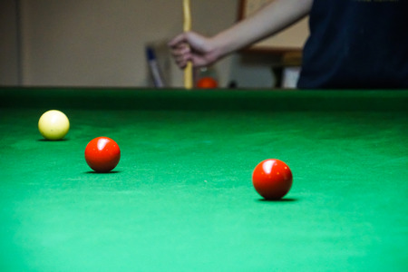 people playing pool snookerの写真素材