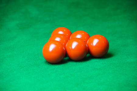red snooker ball on snooker tableの写真素材