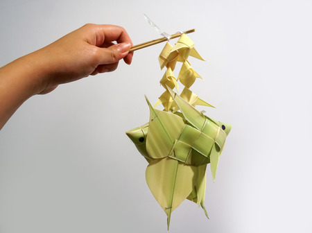 thai style palm leaf carp fish mobile handicraftの写真素材