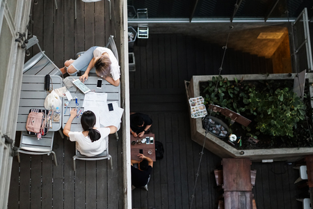 college student study exam at a co-working space, work on laptopの写真素材