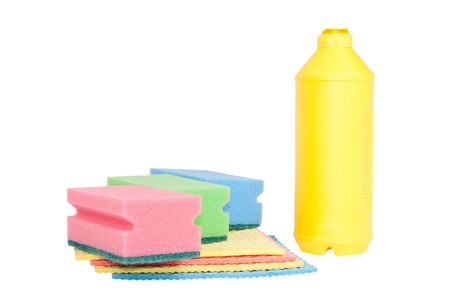 Bottle, colorful sponges isolated on white backgroundの写真素材