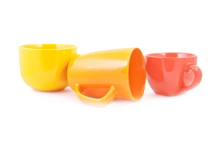 Set of colorful cups isolated on white backgroundの写真素材