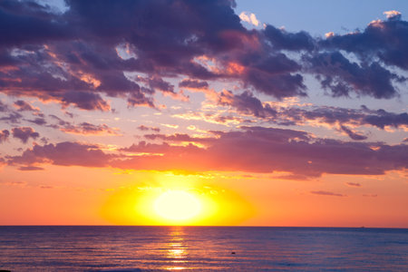 sunset at coast of the sea close upの写真素材