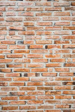 Background of old vintage brick wallの写真素材