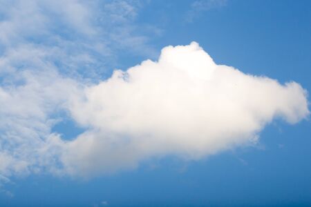 blue sky background with tiny cloudsの写真素材