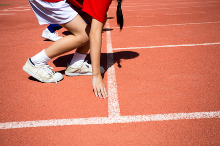 Kid on track in the Stadiumの写真素材
