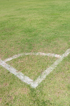 Football goal detail with a soccerの写真素材