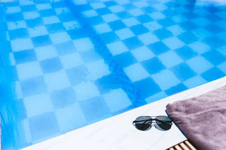 Beach accessories by the swimming pool.