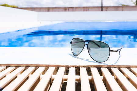 Beach accessories by the swimming pool.の写真素材