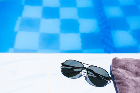 Beach accessories by the swimming pool.の写真素材
