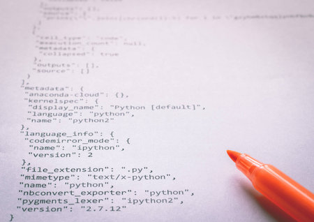 Learning programming language Python printed on paperの写真素材