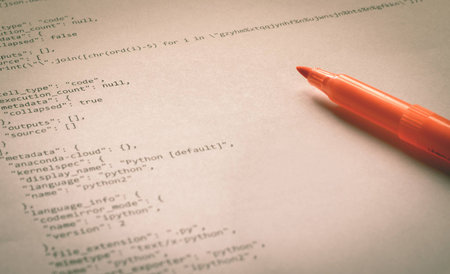 Learning programming language Python printed on paperの写真素材