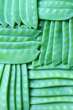 Geometric ornament made of green peas.