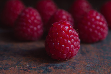 Summer berry background, raspberry berries close up, food backdrop