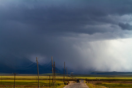 Kyrgyzstan, Pamir tract, road to the mountains before a thunderstorm