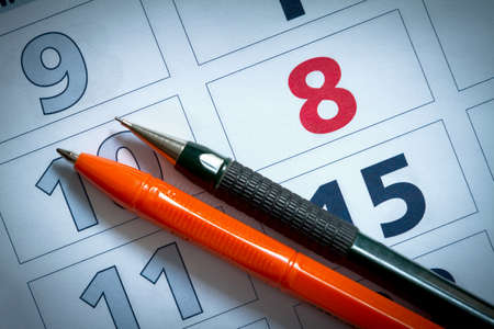 Part of calendar for March, 2021 with pen, office backgroundの写真素材