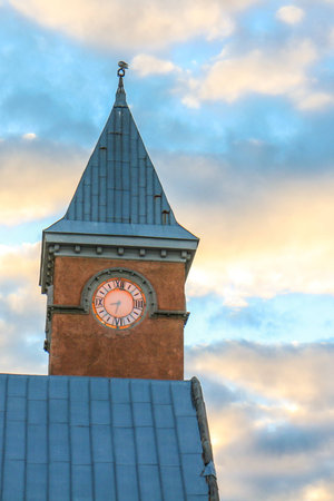 Clock tower in Europe on the sky background