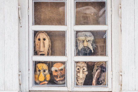 Wooden Window Frame with Ethnic Mask