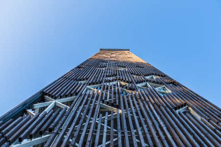 Bottom View to The Observation Tower in the Sky Backgroundの写真素材