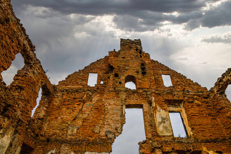 old manor bricks ruin with dramatic sky. Republic of Paulava, Lithuania