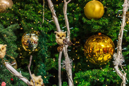 holiday background with Christmas character on the treeの写真素材