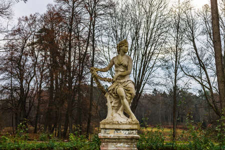 antique ancient goddesses sculpture at Uzutrakis manor estate parkの写真素材