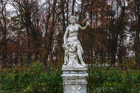 antique ancient goddesses sculpture at Uzutrakis manor estate parkの写真素材